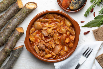 Tripes in clay pot. Top view. Rustic appearance. (Callos a la Madrileña).