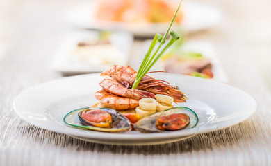 Various Seafood plates, close up, fine dining, outdoors