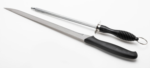 Ham knife (to cut ham) and sharpener (chaira, cheira). Isolated on white background.