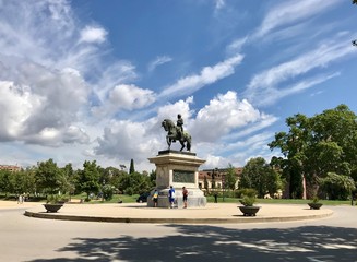 Barcelona, Spain / June 12, 2018: Summer landscape with monumentб sky and trees in Barcelona Zoo