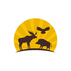 Silhouette of a moose, owls and wild boar