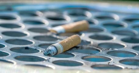 3256_Close_up_view_of_the_cigarette_butt_on_the_bin.jpg