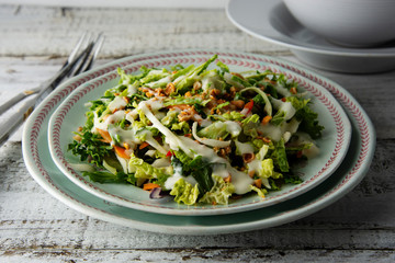 Sweet Kale salad - healthy vegetarian salad with cabbage, eggs, greens, carrots and mayonnaise.