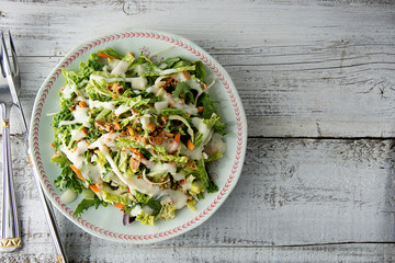 Sweet Kale salad - healthy vegetarian salad with cabbage, eggs, greens, carrots and mayonnaise.