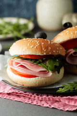 Hamburger with ham. Two burgers, hoemmade food. healthy sandwich with fresh vegetables.