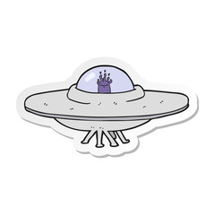 sticker of a cartoon flying saucer