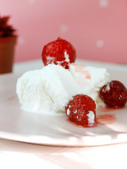 creamy ice cream with strawberries on a pink plate delicious healthy dessert