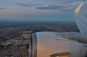 Fototapeta na wymiar Cityscape from Airplane Window