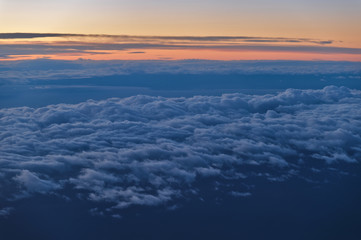 Beautiful Cloudscape Scene at Sunset from Airplane