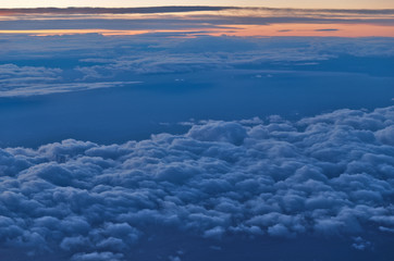 Beautiful Cloudscape Scene at Sunset from Airplane
