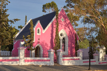Historic Pink Church in Matjiesfontein.  Built in 19th century, now standing in the preserved...
