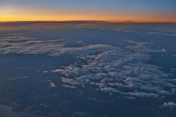 Beautiful Cloudscape Scene at Sunset from Airplane