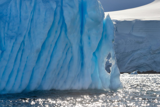 Iceberg with melting patterns