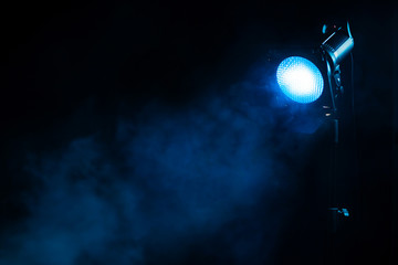 Blue light with smoke. Equipment for photo Studio.