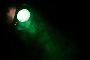 Green light with smoke. Equipment for photo Studio.
