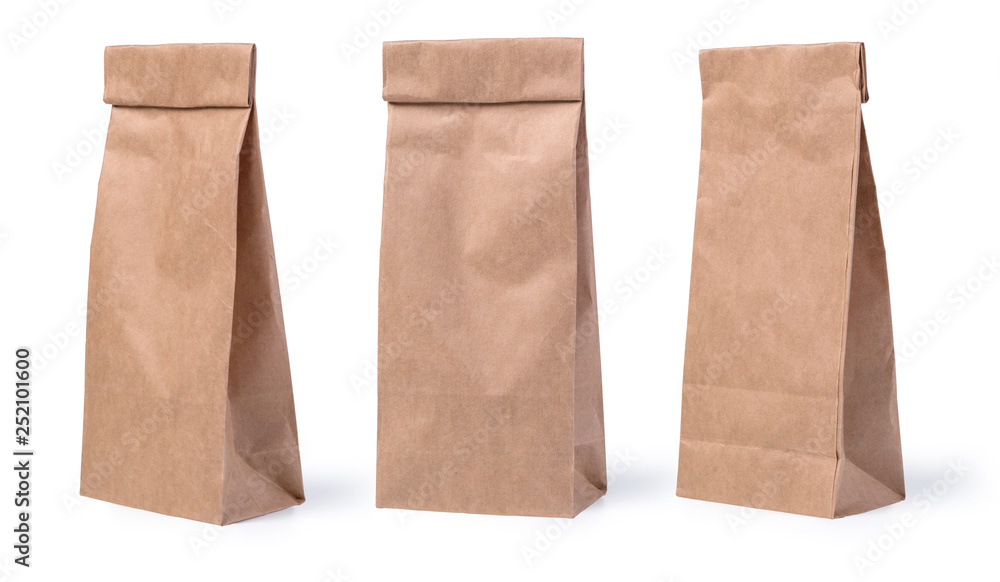 Wall mural Brown paper bag isolated on white