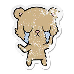 distressed sticker of a crying cartoon bear