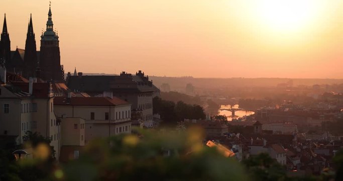 A beautiful view of Prague castle and the city at sunrise on a misty morning