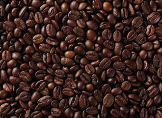 Coffee beans background and texture, top view