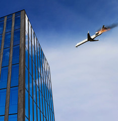 Obraz premium Airplane is flying above and has an engine fire