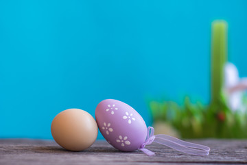 Easter composition with Easter eggs on the blue and red background.