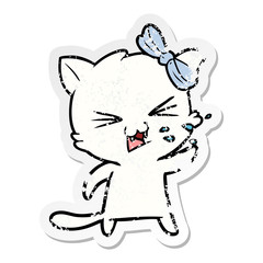 distressed sticker of a cartoon cat