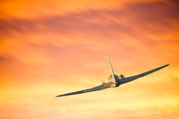 Airplane flying near the clouds