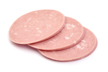 Boiled sausage slices, close-up, isolated on white background