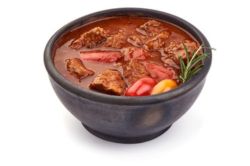 Goulash traditional homemade European beef meat stew soup, close-up, isolated on white background