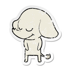 distressed sticker of a cartoon smiling elephant