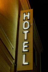 Illuminated hotel sign on facade © Björn Kristersson