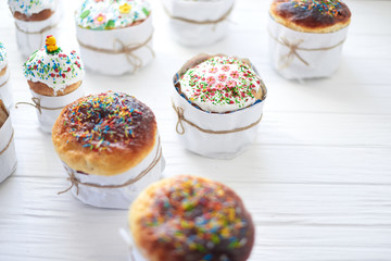 Easter cakes on a white wooden background