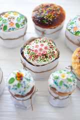 Easter cakes on a white wooden background