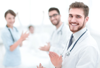 Fototapeta premium Doctors clapping hands and applauding on consent
