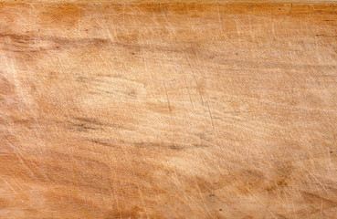 Used scratched wooden cutting surface, texture background.