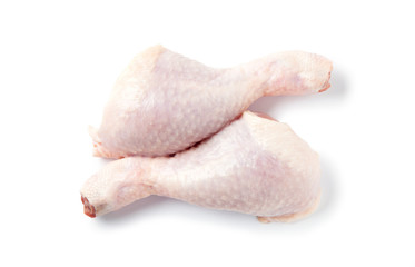 Raw chicken leg, thigh isolated on white background. Top view.