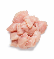 Fresh, raw pieces of chicken fillet isolated on a white background. Top view.