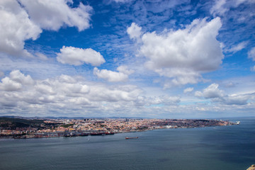 Fototapeta na wymiar aerial view of Lisbon city from opposite side of the river Tagus, Portugal