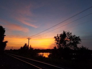 Fototapeta na wymiar Sunset with a lake