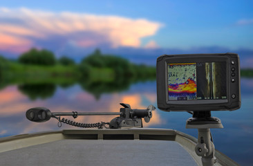 Fishing boat with fish finder, echolot, sonar and structure scaner aboard