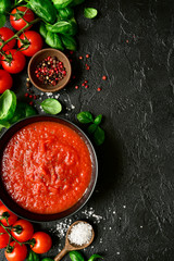 Homemade tomato sauce passata - traditional recipe of italian cuisine.Top view with copy space.