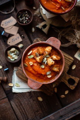 Two clay bowls with vegetable cream soup