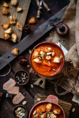 Clay bowls with vegetable cream soup