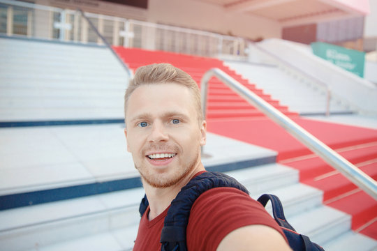 Man Takes Selfie On Background Of Red Carpet At Cannes Film Festival