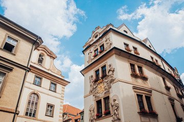 Art 18th century architecture houses with unique stucco, bas-reliefs on facade of building