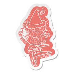 cartoon distressed sticker of a crying dancer wearing santa hat