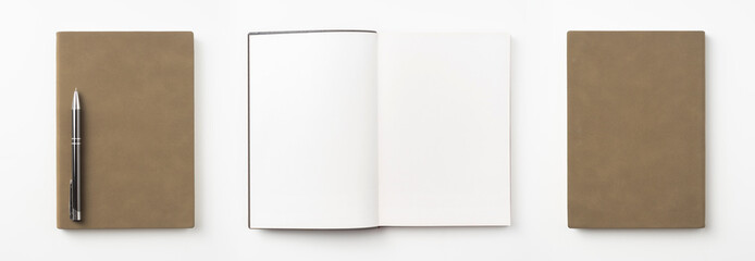 brown notebook and pen on white background