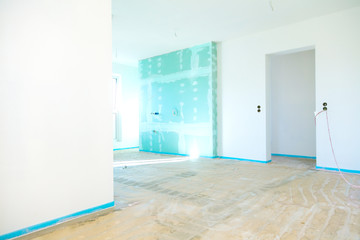 Water underfloor heating pipes in a concrete floor.