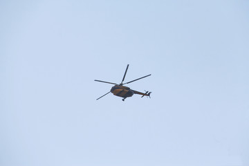 helicopter city services on the background of the evening gray blue