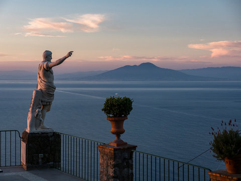 Italy, Campania, Capri, Gulf of Naples, Statue and Vesuv in the background